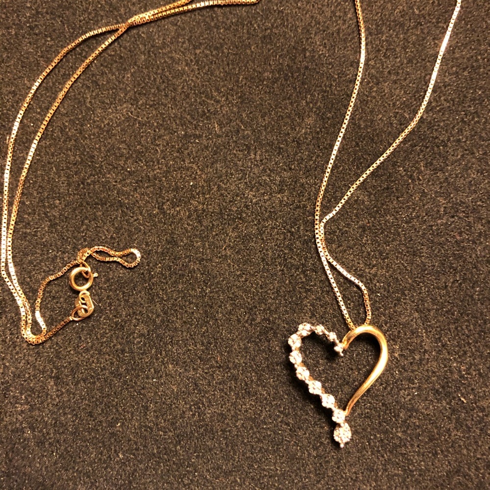 Ladies gold/diamond necklace.